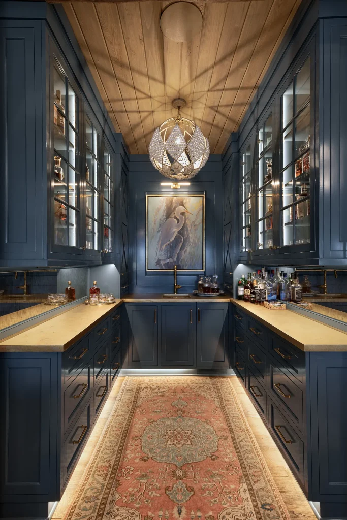 A moody, color-drenched home bar